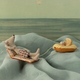 Souris de Plage Papa sur son Matelas